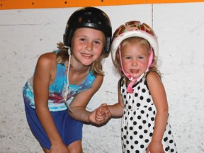 Chloe and Mya Degelas, 7 and 2, slow down to take a break during their roller-skating session at Clearwater Arena on July 12.
CARL HNATYSHYN/SARNIA THIS WEEK