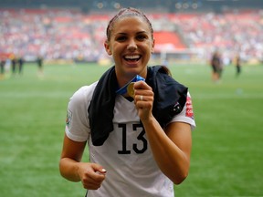 Alex Morgan of the United States celebrates the 5-2 victory against Japan in the FIFA Women's World Cup Canada 2015 Final at BC Place Stadium on July 5, 2015 in Vancouver, Canada. (Kevin C. Cox/AFP)