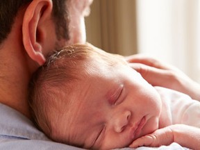 NEW YORK -- Many men gain a new sense of responsibility and purpose when they become fathers. A new study suggests they also gain 3 to 5 pounds. (Fotolia)