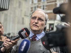 Nazi hunter Efraim Zuroff talks to the media outside a Copenhagen Police Station in Copenhagen, Denmark, Tuesday, July 21, 2015. Nazi hunter Ephraim Zuroff of the of the Simon Wiesenthal Center has asked Denmark to investigate a 90-year-old Dane suspected of being involved in the mass murder of Jews in Belarus during World War II . (Anthon Unger/POLFOTO via AP)