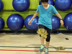 Samantha Reed/The Intelligencer
13-year-old William kicks a sparkly-type hacky sack at the YMCA in Belleville Tuesday afternoon. William is one of the 16 students visiting Belleville from Gunpo, South Korea.