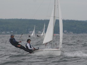 Kingston sailors Arie Moffat, left, and skipper Pat Wilson compete in a regatta at St. Margaret’s Bay, N.S., last week. (Supplied photo)