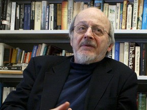 In this April 27, 2004, file photo, American author E.L. Doctorow smiles during an interview in his office at New York University in New York. According to Doctorow's son Richard, the author died Tuesday, July 21, 2015, in New York from complications of lung cancer. He was 84. (AP Photo/Mary Altaffer, File)