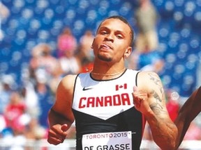 Scarborough’s Andre De Grasse runs at the Pan Am Games. (Michael Peake/Toronto Sun)
