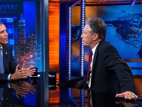 U.S. President Barack Obama, left, talks with Jon Stewart, host of "The Daily Show" during a taping, on Tuesday, July 21, 2015, in New York. (AP Photo/Evan Vucci)