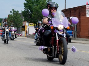 Members of the Iron Sirens motorcycle club and their supporters roar through Woodstock during the Tori Stafford Memorial Ride in 2014. (Sentinel-Review file photo).