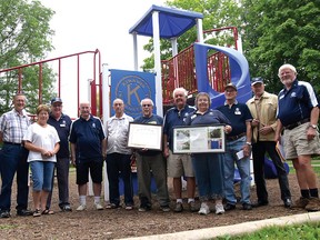 Several members of the Kiwanis Club of Tillsonburg, celebrating their 60th anniversary this week, gather at Kiwanis Coronation Park. From left are Denis Hallett, Kathy Smith, Ron Bates, Gerry Carter, Tom Smith, Robert L. Franklin, Gord Blake, Rosie Couture, Norm Smith, Pat Mooney, and Mike Coombes. (CHRIS ABBOTT/TILLSONBURG NEWS)