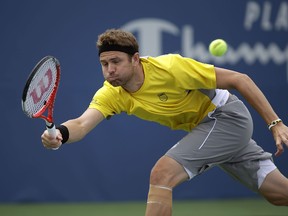 Mardy Fish stretches to return a shot against Jarkko Nieminen during a tournament in Winston Salem, North Carolina. (Bob Leverone/Getty Images/AFP)