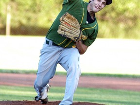 Wallaceburg Warriors pitcher Jesse Paradis rears back and throws home during a game held at Kinsmen Park on July 15. The Warriors are back in the Western Counties senior men's league after a hiatus of five years.
