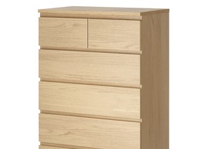This product image provided by Ikea shows a Malm 6-drawer dresser. The U.S. Consumer Product Safety Commission (CPSC), in cooperation with IKEA North America, is announcing a repair program that includes a free wall anchoring kit, for their Malm 3- and 4-drawer chests and two styles of Malm 6- drawer chests, and other chests and dressers.  The chests and dressers can pose a tip-over hazard if not securely anchored to the wall. (Ikea via AP)