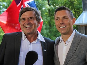 Simcoe North PC MPP Garfield Dunlop, left, with PC Party Leader Patrick Brown Wednesday, July 22, 2015 in Coldwater as Dunlop announced he will be resigning his seat in the legislature effective Aug. 1. (ROBERTA BELL/POSTMEDIA NETWORK)