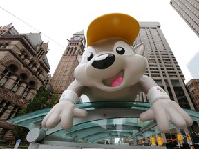 Pachi, the mascot for the Pan Am Games, is displayed on a bus stop in downtown Toronto, Thursday, July 9, 2015. (AP Photo/Julio Cortez)