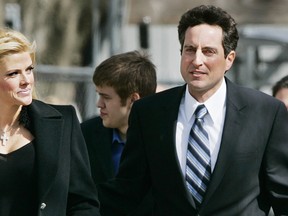 In this Feb. 28, 2006 file photo, Anna Nicole Smith, left, and her lawyer, Howard K. Stern leave the U.S. Supreme Court in Washington. (AP Photo/Manuel Balce Ceneta, File)