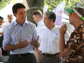 Liberal leader Justin Trudeau meets with the public during a stop at the Winnipeg Fringe Festival in Old Market Square on Wed., July 22, 2015. Kevin King/Winnipeg Sun/Postmedia Network
