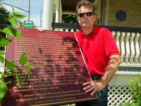 Curator Grant Maltman said Wednesday thieves tried to steal this 36-kilogram federal plaque from outside London?s Banting House heritge museum. They?ve installed tamper-proof bolts in response. (MIKE HENSEN, The London Free Press)