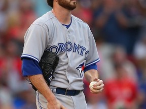 Drew Hutchison's scheduled start for the Blue Jays on Thursday is in jeopardy as the pitcher has fallen ill. R.A. Dickey would replace him. (AFP/PHOTO)
