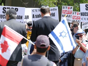 A group called StandWithUs Canada demonstrates on University Ave. across from the U.S. Consulate on Wednesday July 22, 2015 against the nuclear deal with Iran. (Jack Boland/Toronto Sun)