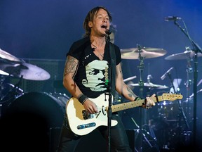 Keith Urban performs at Rexall Place on Wednesday. (DAVID BLOOM/Edmonton Sun)