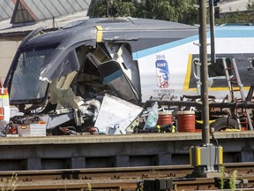 A damaged train carriage is pictured at the scene of a crash between high-speed train and a truck at a rail crossing in the town of Studenka, east of Prague, Czech Republic, July 22, 2015. (REUTERS/Stringer)