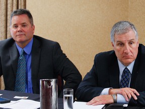 Peterborough Police Chief Murray Rodd, right, and Deputy Police Chief Tim Farquharson, seen here at an arbitration hearing in May, have reportedly received termination payouts totalling as much as $400,000 even though they never lost their jobs. (Clifford Skarstedt/Peterborough Examiner/Postmedia Network)