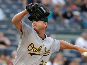 Oakland Athletics pitcher Scott Kazmir delivers against the New York Yankees during MLB play Wednesday, July 8, 2015, in New York. (AP Photo/Julie Jacobson)