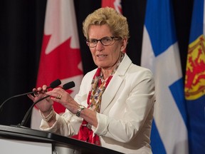 Ontario Premier Kathleen Wynne fields questions at the summer meeting of Canada's premiers in St. John's on Thursday, July 16, 2015. (THE CANADIAN PRESS/Andrew Vaughan)