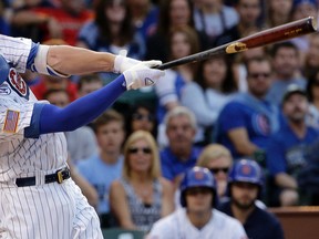 Chicago Cubs slugger Kris Bryant hits a grand slam during MLB action against the Miami Marlins, Saturday, July 4, 2015, in Chicago. (AP Photo/Nam Y. Huh)