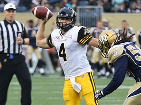 Tony Burnett (right, during the pre-season) will make his professional debut, primarily on special teams, Saturday in Edmonton.