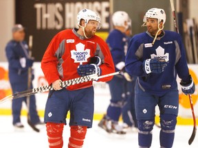 Maple Leafs forwards Nazem Kadri (right) and Phil Kessel, since traded to Pittsburgh, chat with each other during a practice last season. (MICHAEL PEAKE, Toronto Sun)
