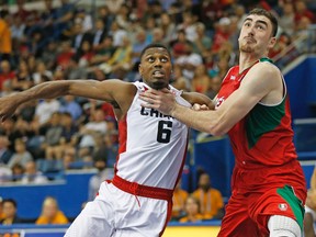Canada’s Melvin Ejim jostles with Jose Guitierrez of Mexico during last night’s game at the Mattamy Athletic Centre. Canada completed the round-robin portion undefeated. (JACK BOLAND, Toronto Sun)
