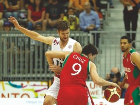 Canada’s Aaron Doornekamp guards against Mexico’s Francisco Cruz during Thursday night’s game. (JACK BOLAND/Toronto Sun)