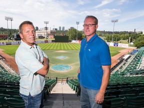 Gord Gerlach (left) and Mark Randall pose for a photo at Telus Field in Edmonton, Alta., on Thursday July 23, 2015.  Ian Kucerak/Edmonton Sun/Postmedia Network