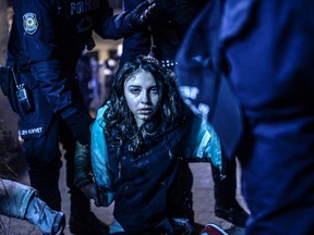 A young girl is pictured after she was wounded during clashes in Istanbul on March 12, 2014. The photo is part of the World Press Photo 15 exhibition tour. The annual display of award-winning work by international photojournalists kicked off its Canadian tour at the war museum in Ottawa on Thursday. THE CANADIAN PRESS/HO-World Press Photo-Bulent Kilic