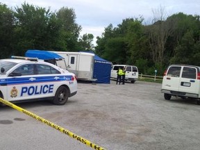 Ottawa Police and paramedics are searching the Conroy Pit Friday morning for missing Hunk-Kai Cheng, 32. He was spotted in the area with a sword, on two occasions, Thursday afternoon. (JULIENNE BAY Ottawa Sun / Postmedia Network)
