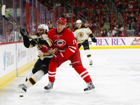 Alexander Semin (right), seen here checking Bruins forward Patrice Bergeron (left) in a game last season, has signed a one-year contract with the Canadiens on Friday, July 24, 2015. (James Guillory/USA TODAY Sports/Files)