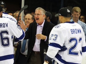 Tampa Bay Sports & Entertainment CEO and minority owner Tod Leiweke (middle) celebrates with Tampa Bay Lightning wingers Nikita Kucherov (86) and J.T. Brown (23) after Game 7 of the Eastern Conference final against the New York Rangers at Madison Square Garden. (Brad Penner/USA TODAY Sports)