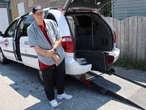 United Taxi office manager Jeff McAuley stands with the company's accessible tax in Sarniai. It's the first of its kind in the city in several years, officials say. Tyler Kula/Sarnia Observer/Postmedia Network