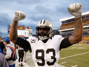 Junior Galette of the New Orleans Saints celebrates a win over the Pittsburgh Steelers at Heinz Field on November 30, 2014 in Pittsburgh. (Gregory Shamus/Getty Images/AFP)
