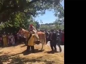 B.C. groom is pictured riding a horse at his wedding in this YouTube video screengrab. (YouTube screengrab)
