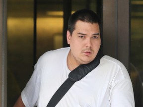 Samuel Lute leaves the Elgin Street courthouse on Friday July 24, 2015. Lute was released from custody on a $2,500 bond after a court appearance Friday. Lute was charged with two counts of sexual assault and sexual interference after police alleged he had inappropriate contact with two preteen girls at the Kanata Wave Pool on Thursday.
Tony Caldwell/Ottawa Sun