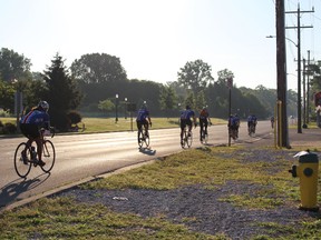 Thirty cyclists speed off toward London where the group will spend Friday night as they head East on a 50-day, cross-continent bike ride. The group crossed the Blue Water Bridge in the early hours of Friday morning. Chris O’Gorman/ The Observer