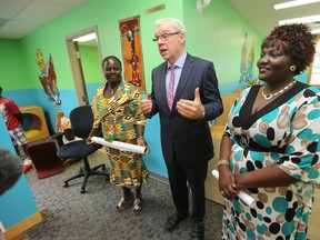 Premier Greg Selinger attended the opening of a new child-centre Friday, July 24, 2015. The centre is called Garderie Les Petits Genies, and has approximately 40 places. Selinger is standing between the director Haoua Moussa (right), and executive director Anik Lia-Pehe.