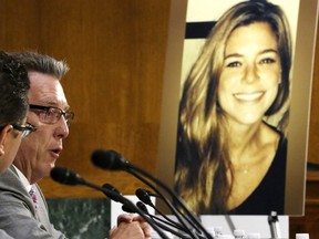 Jim Steinle (L), father of murder victim Kathryn Steinle (in photo, R), allegedly at the hands of an undocumented immigrant, testifies about his daughter's murder during a hearing of the Senate Judiciary Committee on U.S. immigration enforcement policies, on Capitol Hill in Washington July 21, 2015.  REUTERS/Jonathan Ernst