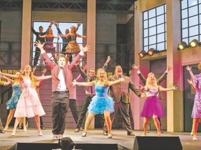 Colin Sheen leads the company, including LaSalle native Danielle Wade, centre left, in Drayton Entertainment?s production of Footloose, in preview Saturday and opening Sunday at Huron Country Playhouse. The show continues until Aug. 8. (Darlene O?Rourke, Special to Postmedia News)