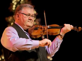 Calvin Vollrath with his fiddle. Vollrath will be performing at the Blueberry Bluegrass and Country festival July 31 to Aug. 2. - Photo Supplied