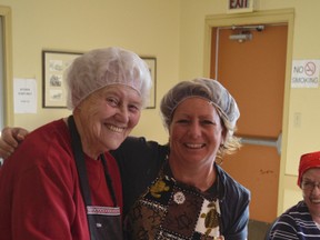 Hard-working volunteers prepare the bi-annual perogy supper for the Carvel Ukrainian Cultural Society at Carvel Hall. The next perogy supper is on Oct. 2. - Thomas Miller, File Photo