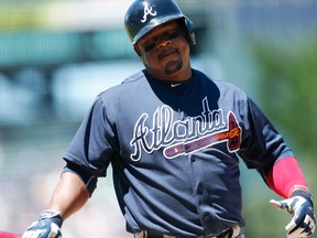 Atlanta Braves' Juan Uribe is reportedly headed to the New York Mets along with teammate Kelly Johnson. (AP Photo/David Zalubowski)