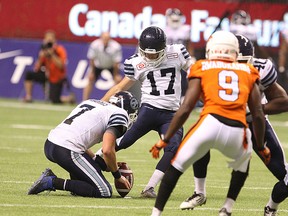 Toronto Argonauts Ronnie Pfeffer kick for a field goal during the second half of CFL action against BC Lions in Vancouver, B.C. on Friday July 24, 2015, Carmine Marinelli/Postmedia Network