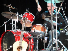 Spirit of the West Drummer Vince Ditrich performs before a crowd of about 5,000 on Wednesday, Aug. 14, 2013, during a Peterborough Musicfest concert at Del Crary Park in Peterborough, Ont. (Rob McCormick/Postmedia Network File Photo)