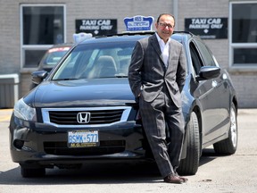 Hanif Patni, President and CEO of Coventry Connections Inc., shown at his office on Friday July 24, 2015. Hanif owns the second largest number of taxi licence plates in Ottawa and he is very concerned about Uber in the city.
Tony Caldwell/Ottawa Sun